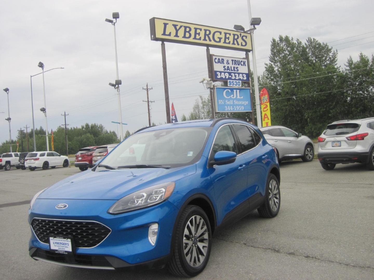 2020 blue /Tan Ford Escape Titanium 4WD (1FMCU9J90LU) with an 2.0L L4 DOHC 16V engine, 6A transmission, located at 9530 Old Seward Highway, Anchorage, AK, 99515, (907) 349-3343, 61.134140, -149.865570 - Photo#0