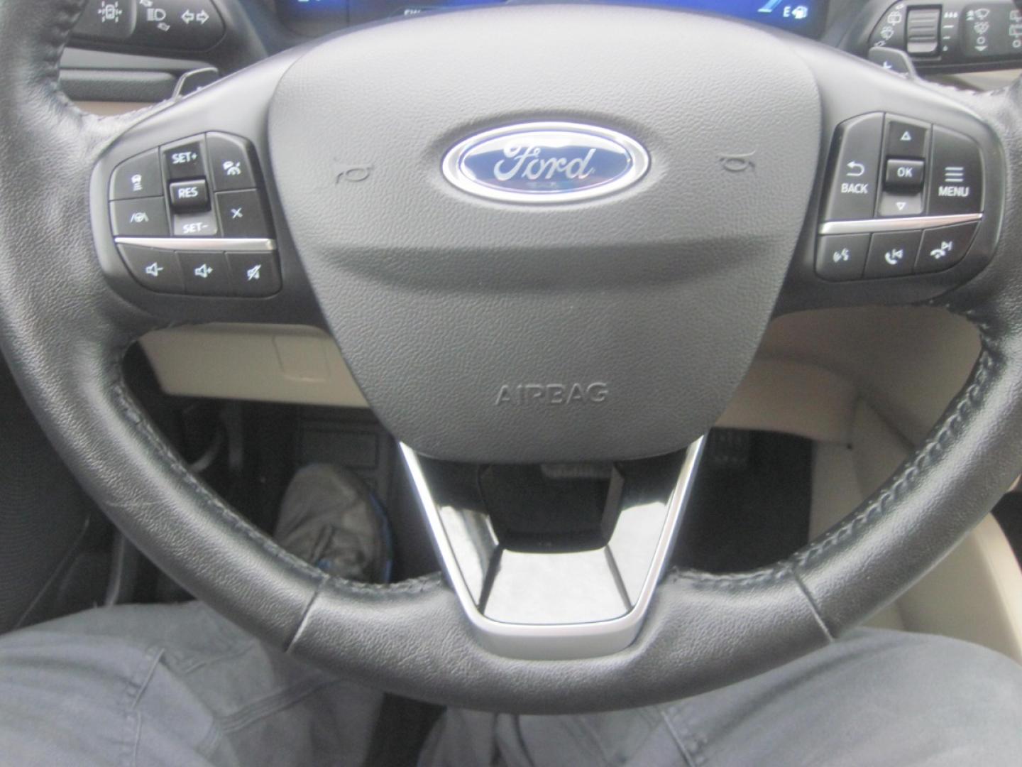 2020 blue /Tan Ford Escape Titanium 4WD (1FMCU9J90LU) with an 2.0L L4 DOHC 16V engine, 6A transmission, located at 9530 Old Seward Highway, Anchorage, AK, 99515, (907) 349-3343, 61.134140, -149.865570 - Photo#10