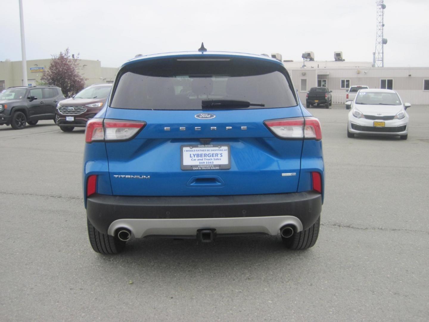 2020 blue /Tan Ford Escape Titanium 4WD (1FMCU9J90LU) with an 2.0L L4 DOHC 16V engine, 6A transmission, located at 9530 Old Seward Highway, Anchorage, AK, 99515, (907) 349-3343, 61.134140, -149.865570 - Photo#3