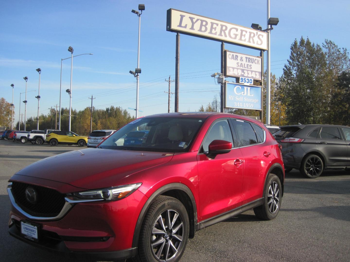 2018 red /black Mazda CX-5 Grand Touring AWD (JM3KFBDM6J0) with an 2.5L L4 DOHC 16V engine, 6A transmission, located at 9530 Old Seward Highway, Anchorage, AK, 99515, (907) 349-3343, 61.134140, -149.865570 - Low Miles on this Mazda CX-5 Grand Touring AWD Loaded , come take a test drive - Photo#0