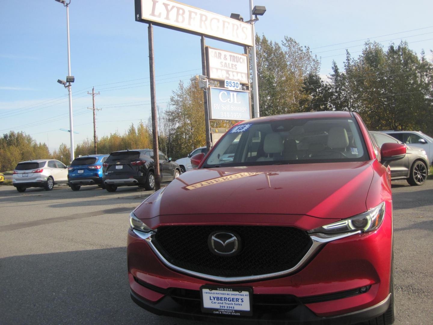 2018 red /black Mazda CX-5 Grand Touring AWD (JM3KFBDM6J0) with an 2.5L L4 DOHC 16V engine, 6A transmission, located at 9530 Old Seward Highway, Anchorage, AK, 99515, (907) 349-3343, 61.134140, -149.865570 - Low Miles on this Mazda CX-5 Grand Touring AWD Loaded , come take a test drive - Photo#1