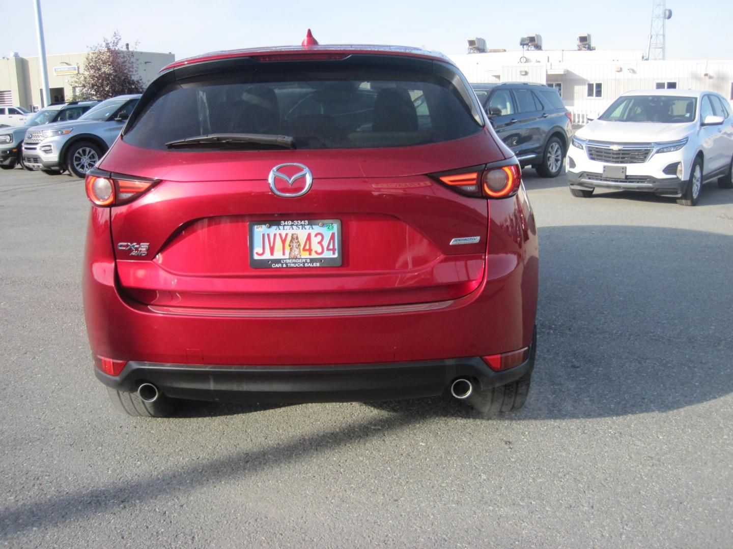 2018 red /black Mazda CX-5 Grand Touring AWD (JM3KFBDM6J0) with an 2.5L L4 DOHC 16V engine, 6A transmission, located at 9530 Old Seward Highway, Anchorage, AK, 99515, (907) 349-3343, 61.134140, -149.865570 - Low Miles on this Mazda CX-5 Grand Touring AWD Loaded , come take a test drive - Photo#3