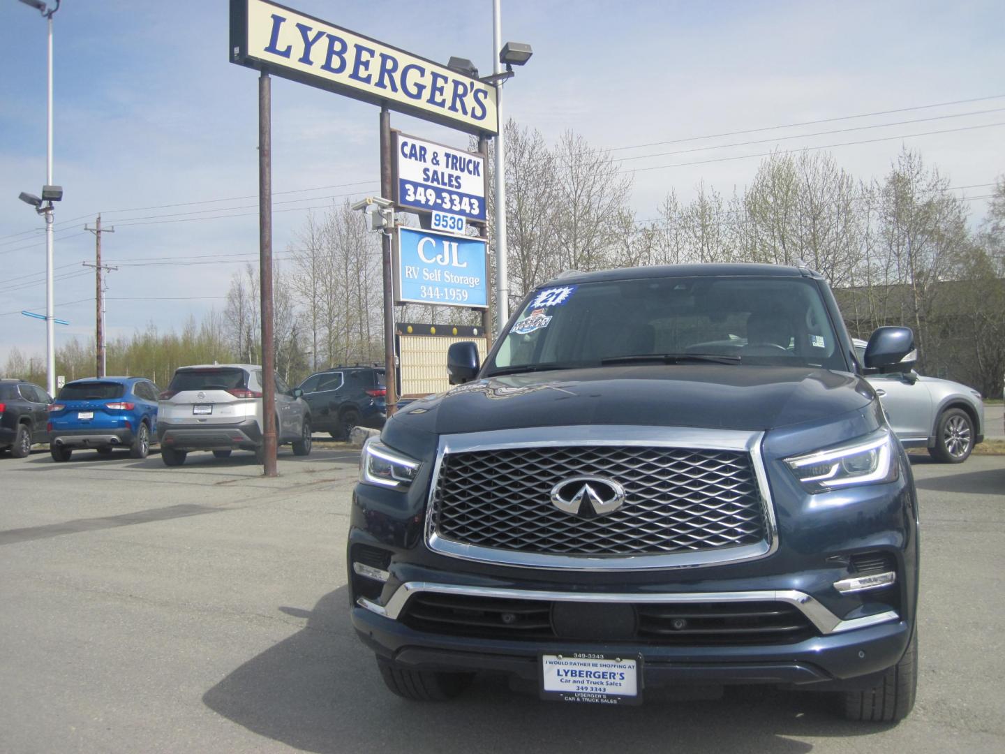 2021 blue /black Infiniti QX80 Luxe 4WD (JN8AZ2AEXM9) with an 5.6L V8 DOHC 32V engine, 7A transmission, located at 9530 Old Seward Highway, Anchorage, AK, 99515, (907) 349-3343, 61.134140, -149.865570 - INFINITI QX 80 LUXE 4WD COME TAKE A TEST DRIVE - Photo#1