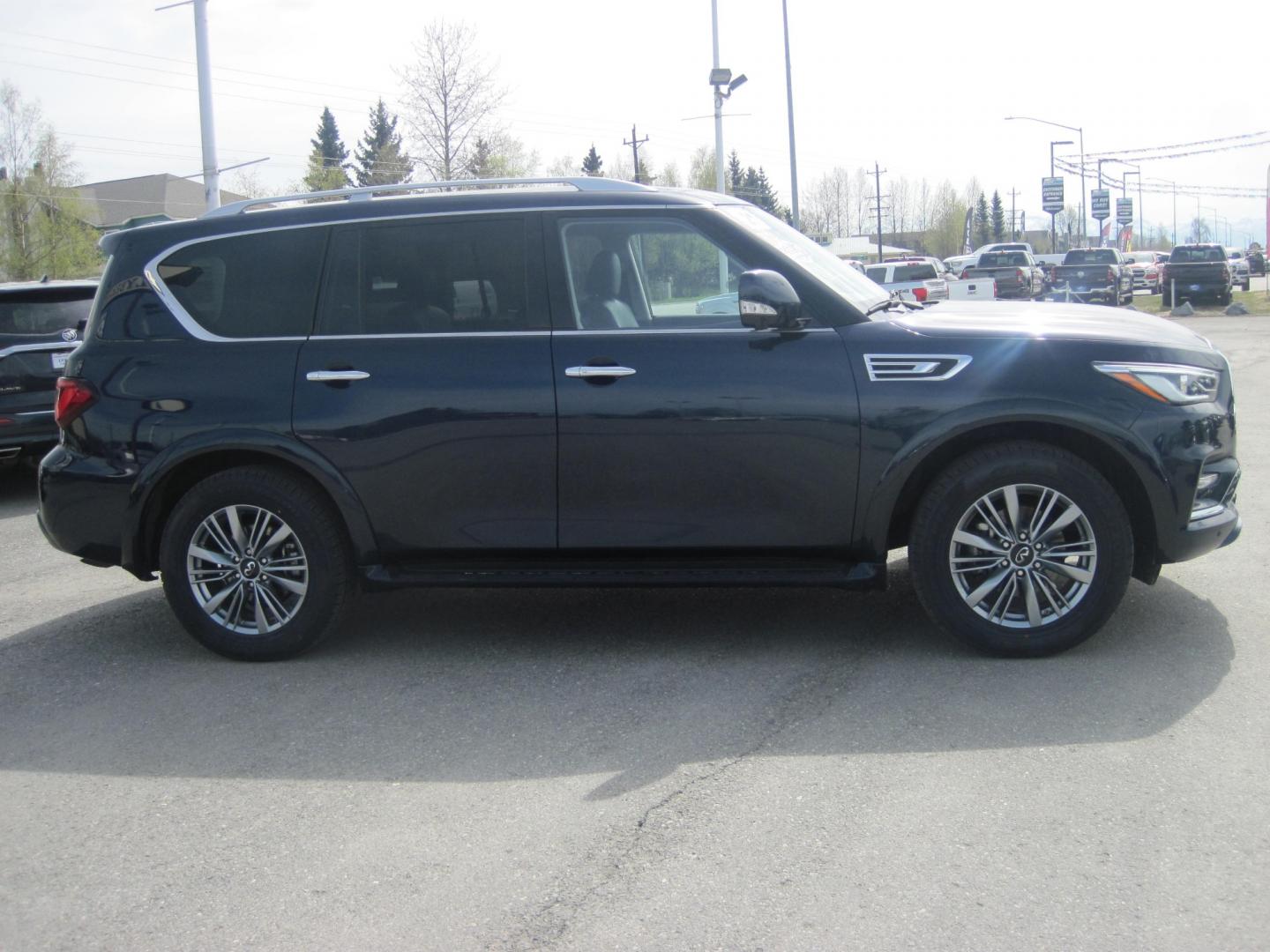 2021 blue /black Infiniti QX80 Luxe 4WD (JN8AZ2AEXM9) with an 5.6L V8 DOHC 32V engine, 7A transmission, located at 9530 Old Seward Highway, Anchorage, AK, 99515, (907) 349-3343, 61.134140, -149.865570 - INFINITI QX 80 LUXE 4WD COME TAKE A TEST DRIVE - Photo#2