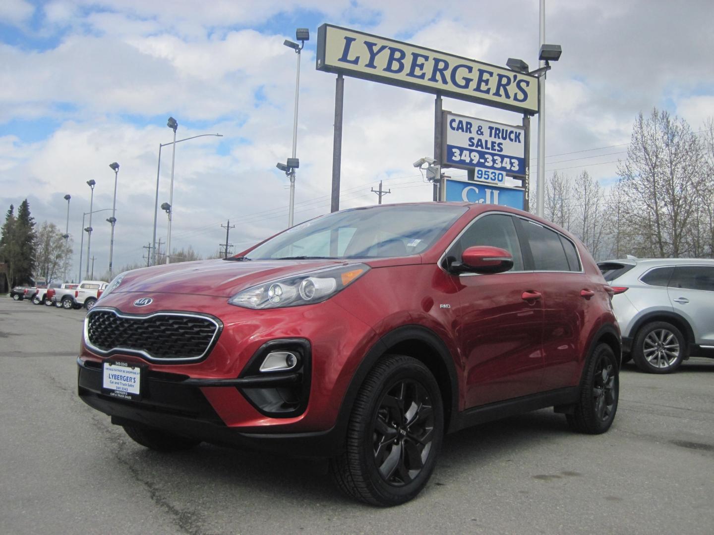 2022 red /black Kia Sportage LX AWD (KNDPMCAC1N7) with an 2.4L V6 DOHC 24V engine, 6A transmission, located at 9530 Old Seward Highway, Anchorage, AK, 99515, (907) 349-3343, 61.134140, -149.865570 - Nice Kia Sportage LX come take a test drive. - Photo#0