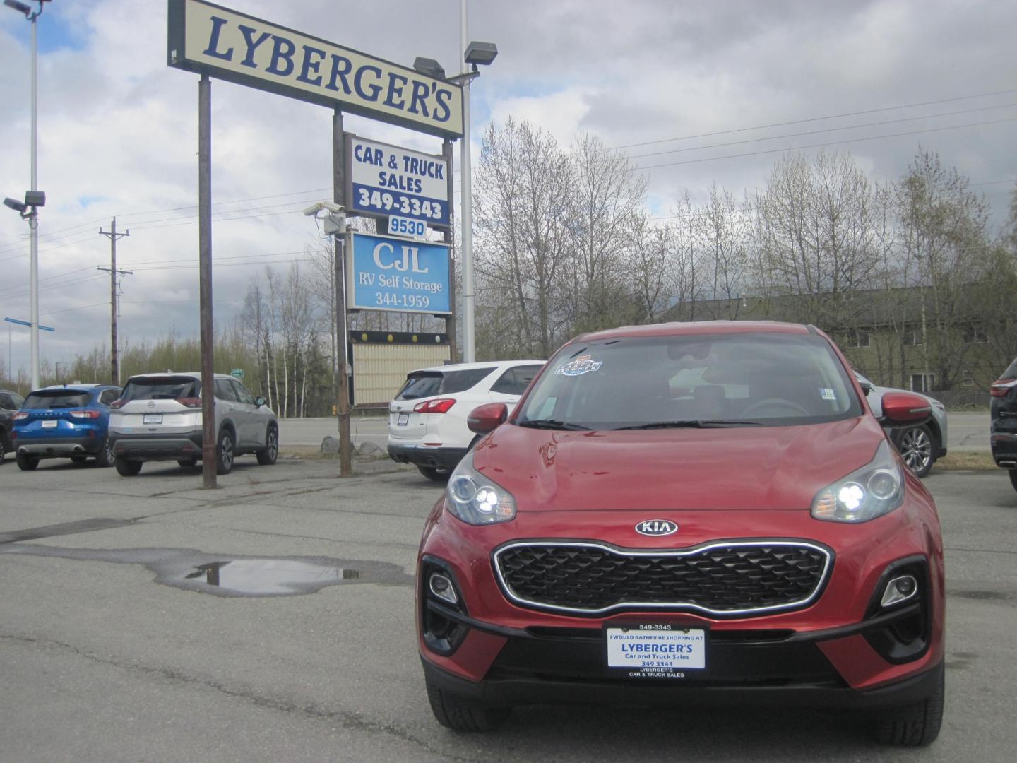 2022 red /black Kia Sportage LX AWD (KNDPMCAC1N7) with an 2.4L V6 DOHC 24V engine, 6A transmission, located at 9530 Old Seward Highway, Anchorage, AK, 99515, (907) 349-3343, 61.134140, -149.865570 - Nice Kia Sportage LX come take a test drive. - Photo#1