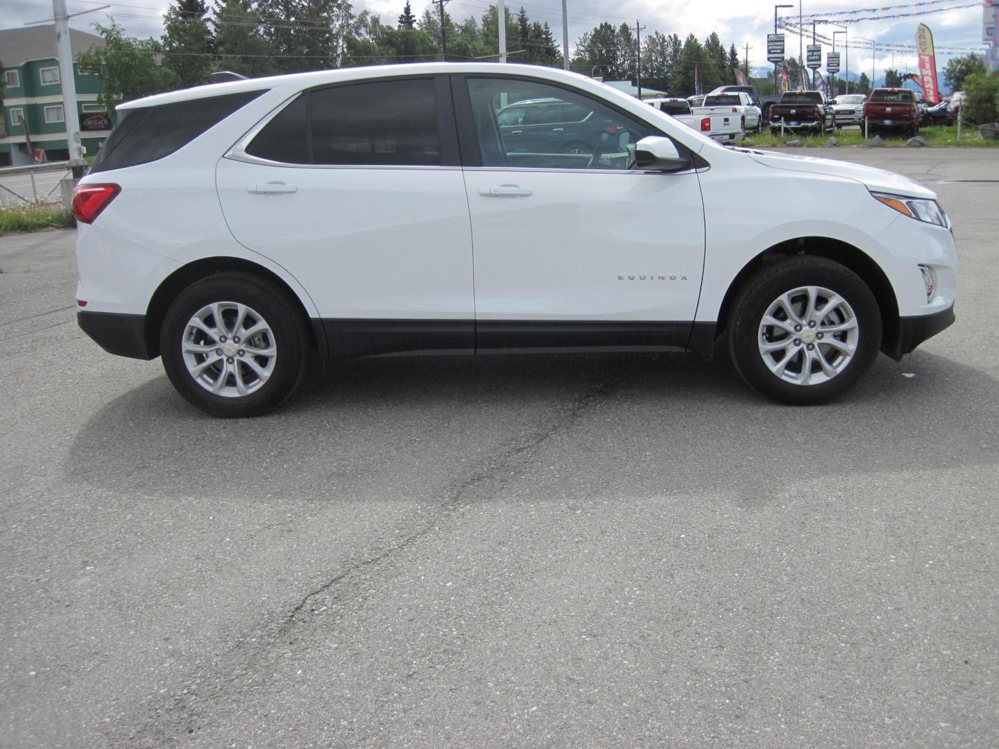 2021 white /black Chevrolet Equinox LT AWD (3GNAXTEV6MS) with an 1.5L L4 DOHC 16V TURBO engine, 6A transmission, located at 9530 Old Seward Highway, Anchorage, AK, 99515, (907) 349-3343, 61.134140, -149.865570 - Nice Chevrolet Equinox AWD come take a test drive - Photo#2