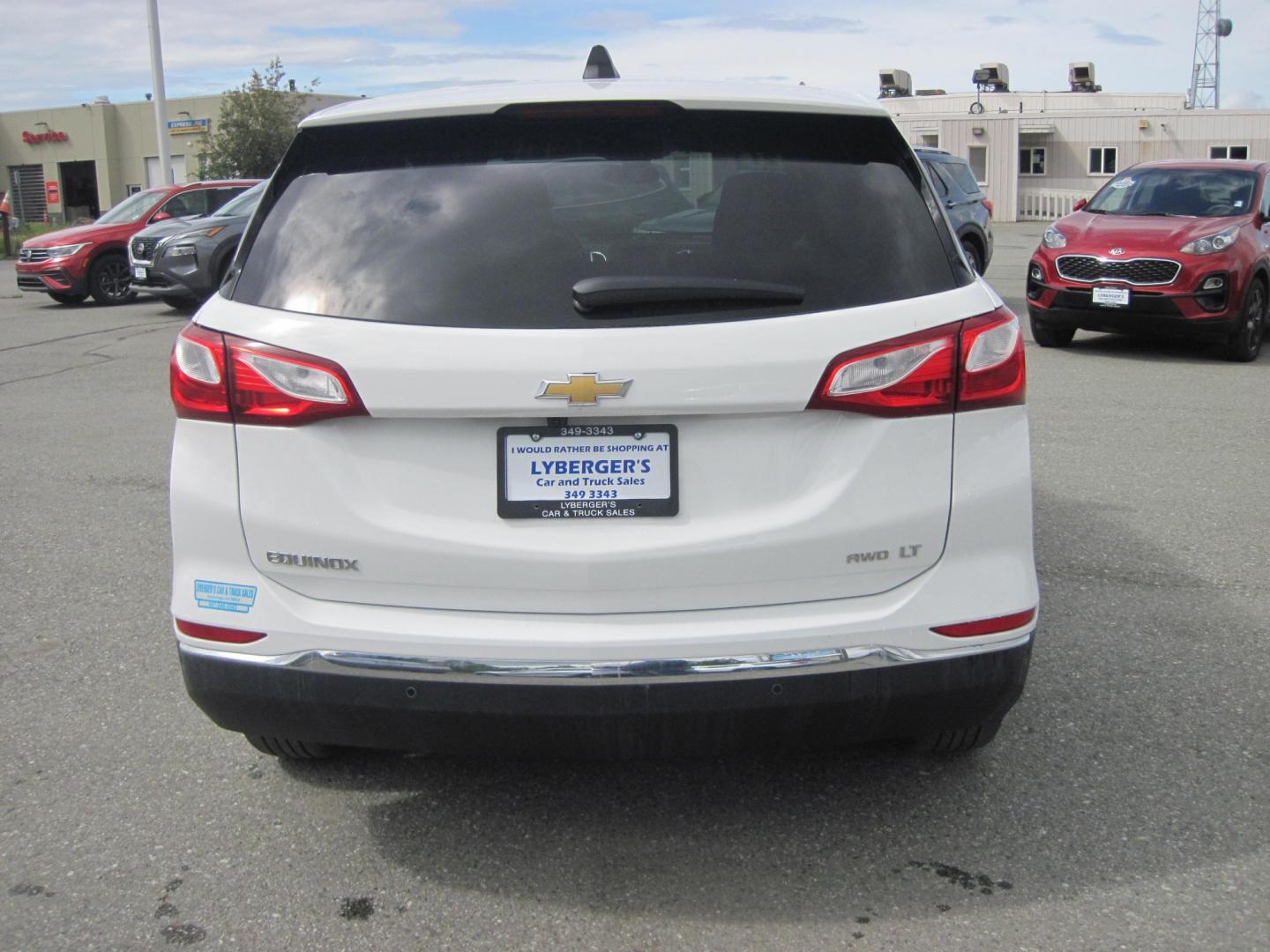 2021 white /black Chevrolet Equinox LT AWD (3GNAXTEV6MS) with an 1.5L L4 DOHC 16V TURBO engine, 6A transmission, located at 9530 Old Seward Highway, Anchorage, AK, 99515, (907) 349-3343, 61.134140, -149.865570 - Nice Chevrolet Equinox AWD come take a test drive - Photo#3