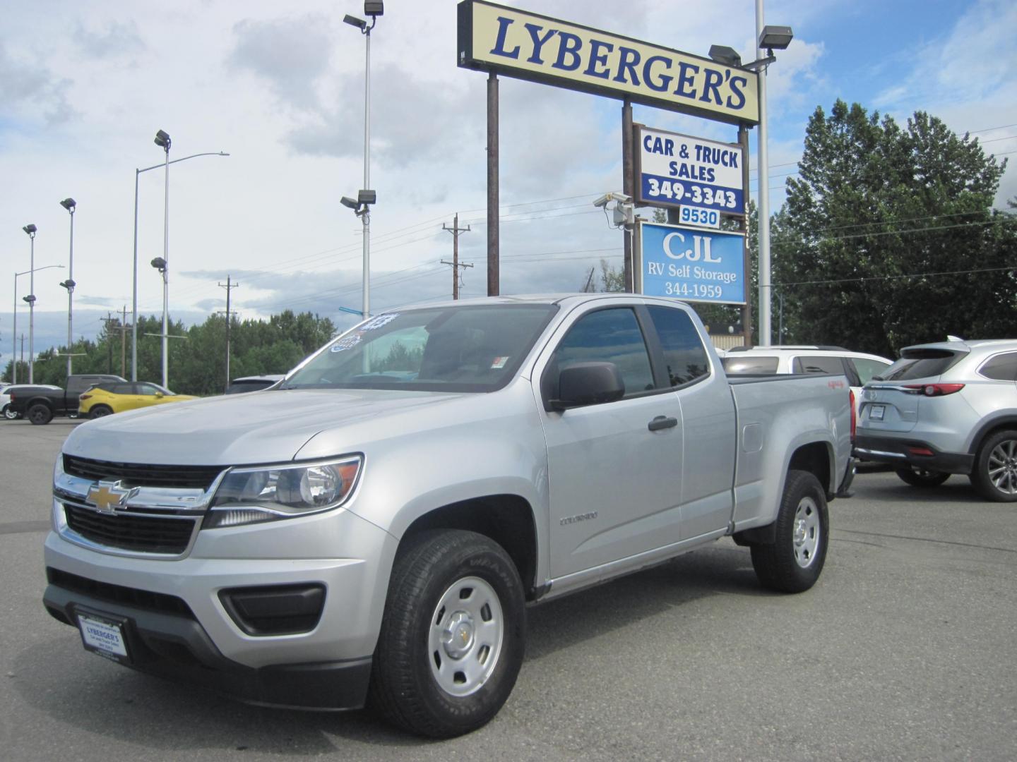 2015 silver /gray Chevrolet Colorado WT Ext. Cab 4WD (1GCHTAEAXF1) with an 2.5L L4 DOHC 16V GAS engine, 6-Speed Automatic transmission, located at 9530 Old Seward Highway, Anchorage, AK, 99515, (907) 349-3343, 61.134140, -149.865570 - Photo#0