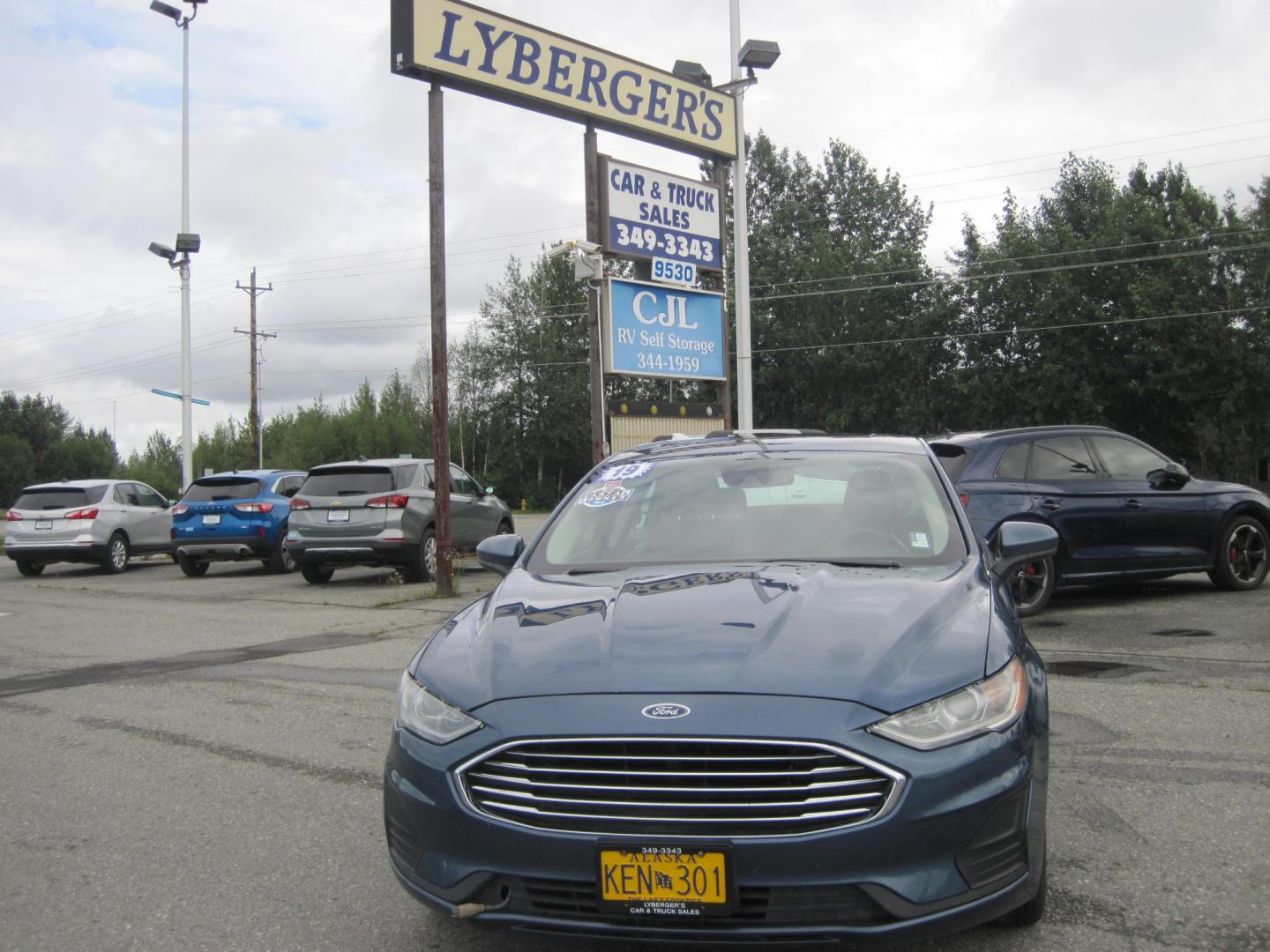 2019 blue /black Ford Fusion SE AWD (3FA6P0T94KR) with an 2.0L L4 DOHC 16V engine, 6-Speed Automatic transmission, located at 9530 Old Seward Highway, Anchorage, AK, 99515, (907) 349-3343, 61.134140, -149.865570 - Nice Ford Fusion AWD , Sunroof come take a test drive. - Photo#1