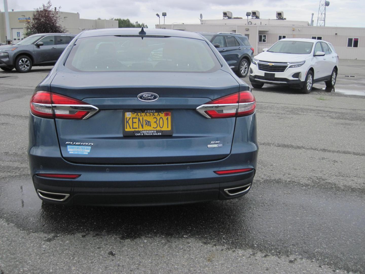 2019 blue /black Ford Fusion SE AWD (3FA6P0T94KR) with an 2.0L L4 DOHC 16V engine, 6-Speed Automatic transmission, located at 9530 Old Seward Highway, Anchorage, AK, 99515, (907) 349-3343, 61.134140, -149.865570 - Nice Ford Fusion AWD , Sunroof come take a test drive. - Photo#3