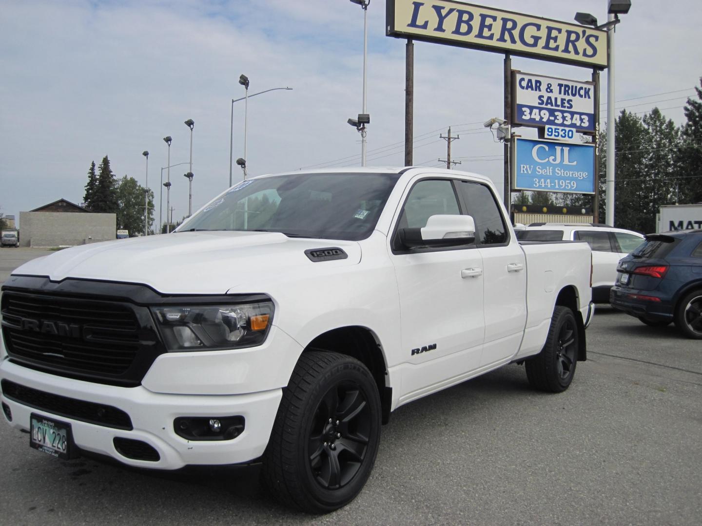 2020 white /black RAM 1500 Big Horn Quad Cab 4WD (1C6SRFBT8LN) with an 3.6L V6 FFV engine, 8A transmission, located at 9530 Old Seward Highway, Anchorage, AK, 99515, (907) 349-3343, 61.134140, -149.865570 - NICE RAM 1500 4WD COME TAKE A TEST DRIVE - Photo#0