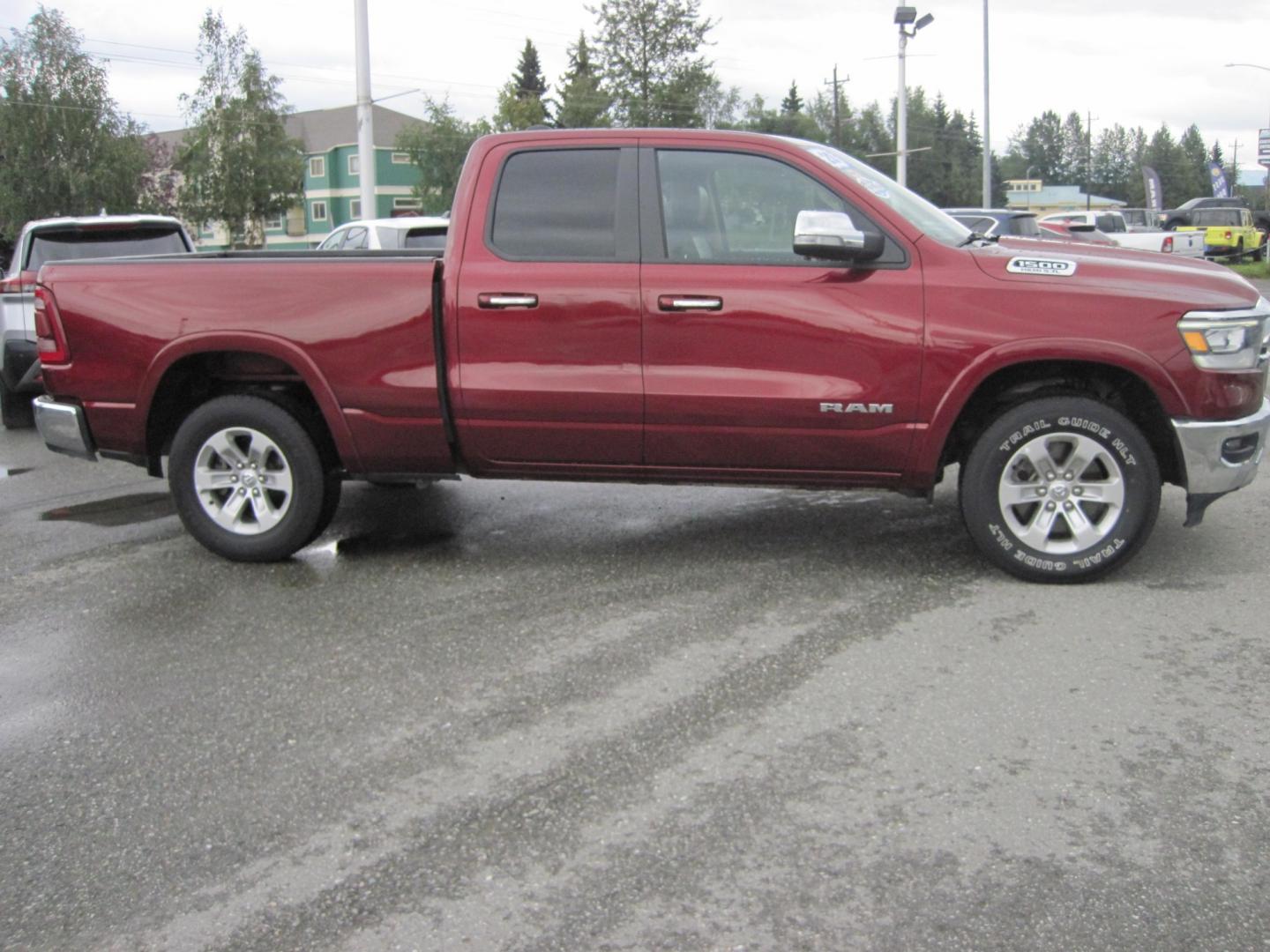 2020 Maroon /black RAM 1500 Laramie Quad Cab 4WD (1C6SRFDT7LN) with an 3.6L V6 FFV engine, 8A transmission, located at 9530 Old Seward Highway, Anchorage, AK, 99515, (907) 349-3343, 61.134140, -149.865570 - Nice Ram 1500 Laramie quad cab come take a test drive - Photo#2