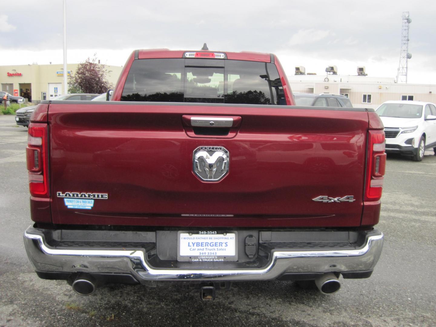 2020 Maroon /black RAM 1500 Laramie Quad Cab 4WD (1C6SRFDT7LN) with an 3.6L V6 FFV engine, 8A transmission, located at 9530 Old Seward Highway, Anchorage, AK, 99515, (907) 349-3343, 61.134140, -149.865570 - Nice Ram 1500 Laramie quad cab come take a test drive - Photo#3