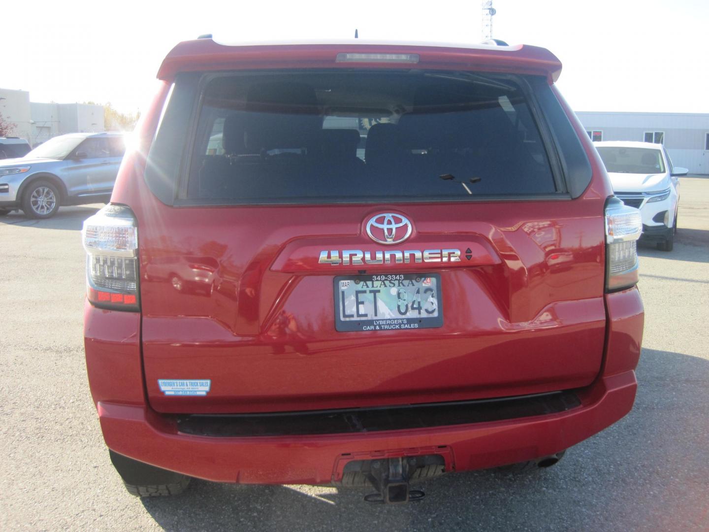 2021 red /black Toyota 4Runner SR5 4WD (JTEMU5JR5M5) with an 4.0L V6 DOHC 24V engine, 5A transmission, located at 9530 Old Seward Highway, Anchorage, AK, 99515, (907) 349-3343, 61.134140, -149.865570 - Nice Toyota 4 Runner SR5 4wd with third row and tow package come take a test drive - Photo#3