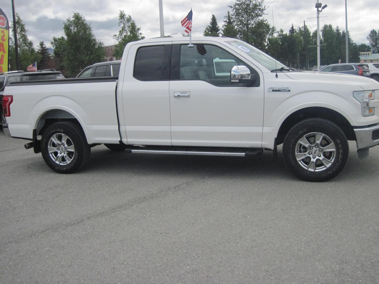 2015 white /black Ford F-150 Lariat (1FTFX1EF7FF) with an 5.0L V8 engine, automatic transmission, located at 9530 Old Seward Highway, Anchorage, AK, 99515, (907) 349-3343, 61.134140, -149.865570 - Nice low miles on this loaded Ford F150 Lariat, come take a test drive. - Photo#2