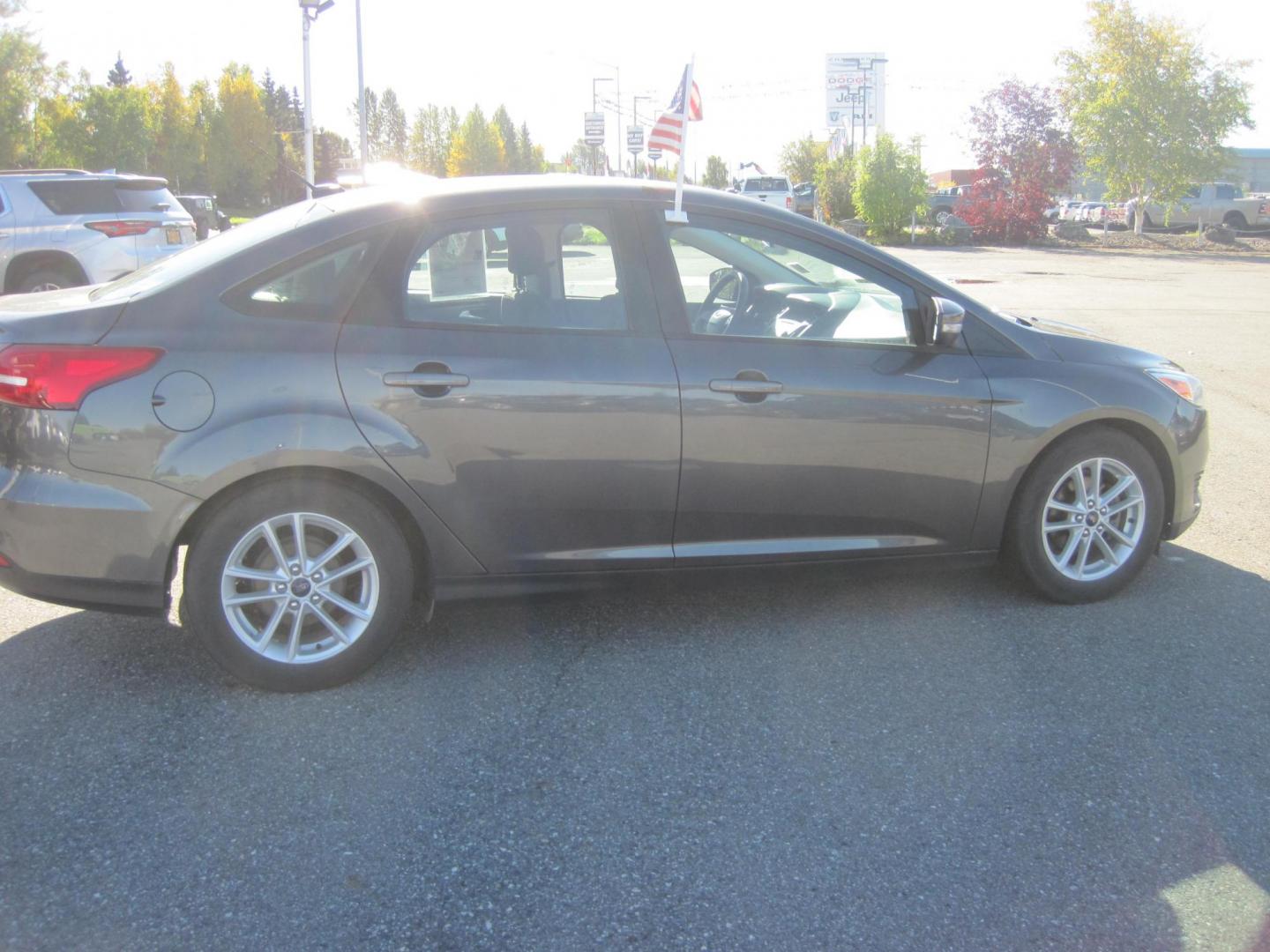 2017 gray /gray Ford Focus SE Sedan (1FADP3F24HL) with an 2.0L L4 DOHC 16V engine, located at 9530 Old Seward Highway, Anchorage, AK, 99515, (907) 349-3343, 61.134140, -149.865570 - Photo#9