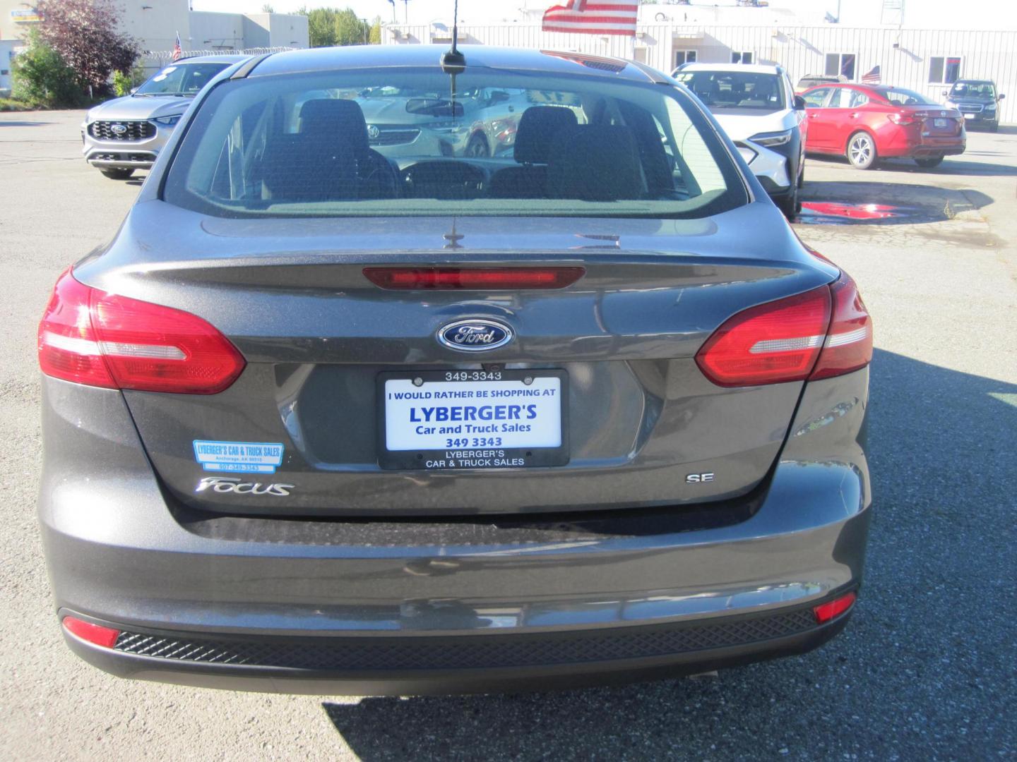 2017 gray /gray Ford Focus SE Sedan (1FADP3F24HL) with an 2.0L L4 DOHC 16V engine, located at 9530 Old Seward Highway, Anchorage, AK, 99515, (907) 349-3343, 61.134140, -149.865570 - Photo#10