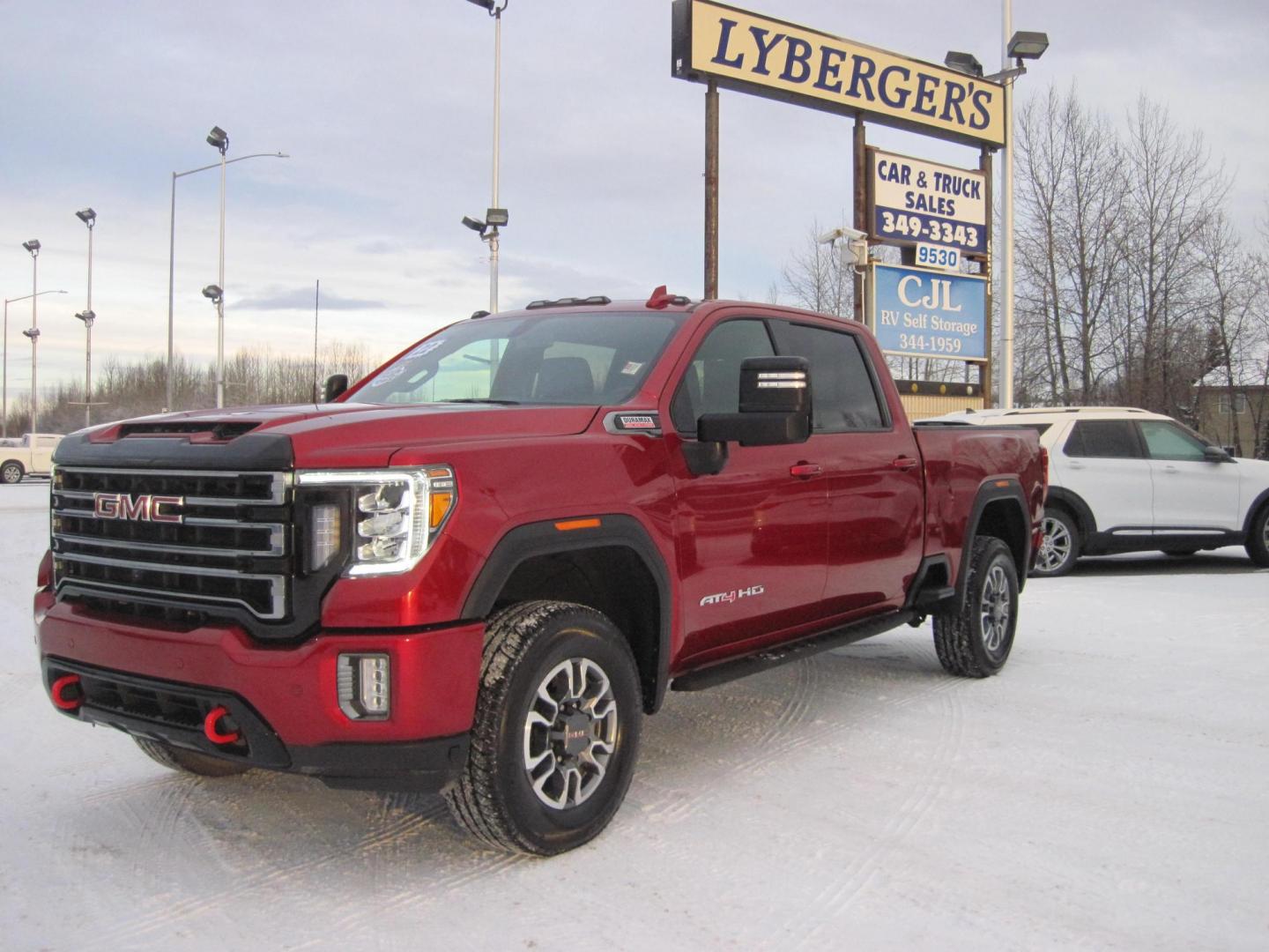 2022 red /black GMC Sierra 2500HD AT4 Crew Cab 4WD (1GT49PEY2NF) with an 6.6L V8 OHV 16 DIESEL engine, 6A transmission, located at 9530 Old Seward Highway, Anchorage, AK, 99515, (907) 349-3343, 61.134140, -149.865570 - Photo#0