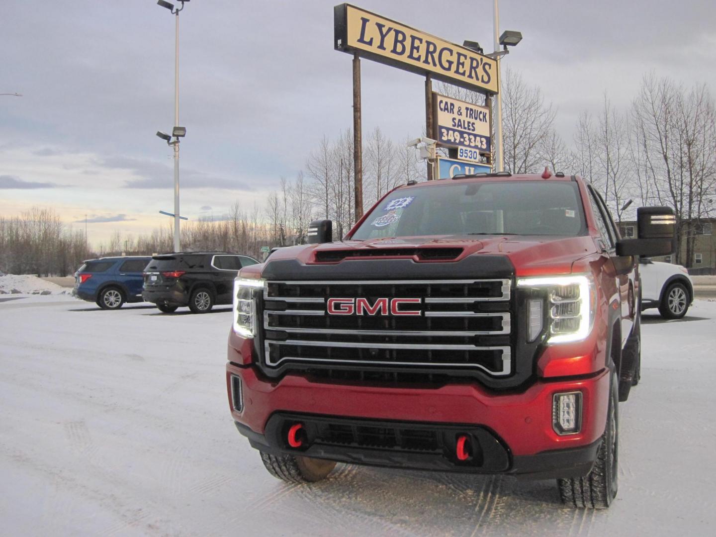 2022 red /black GMC Sierra 2500HD AT4 Crew Cab 4WD (1GT49PEY2NF) with an 6.6L V8 OHV 16 DIESEL engine, 6A transmission, located at 9530 Old Seward Highway, Anchorage, AK, 99515, (907) 349-3343, 61.134140, -149.865570 - Photo#1