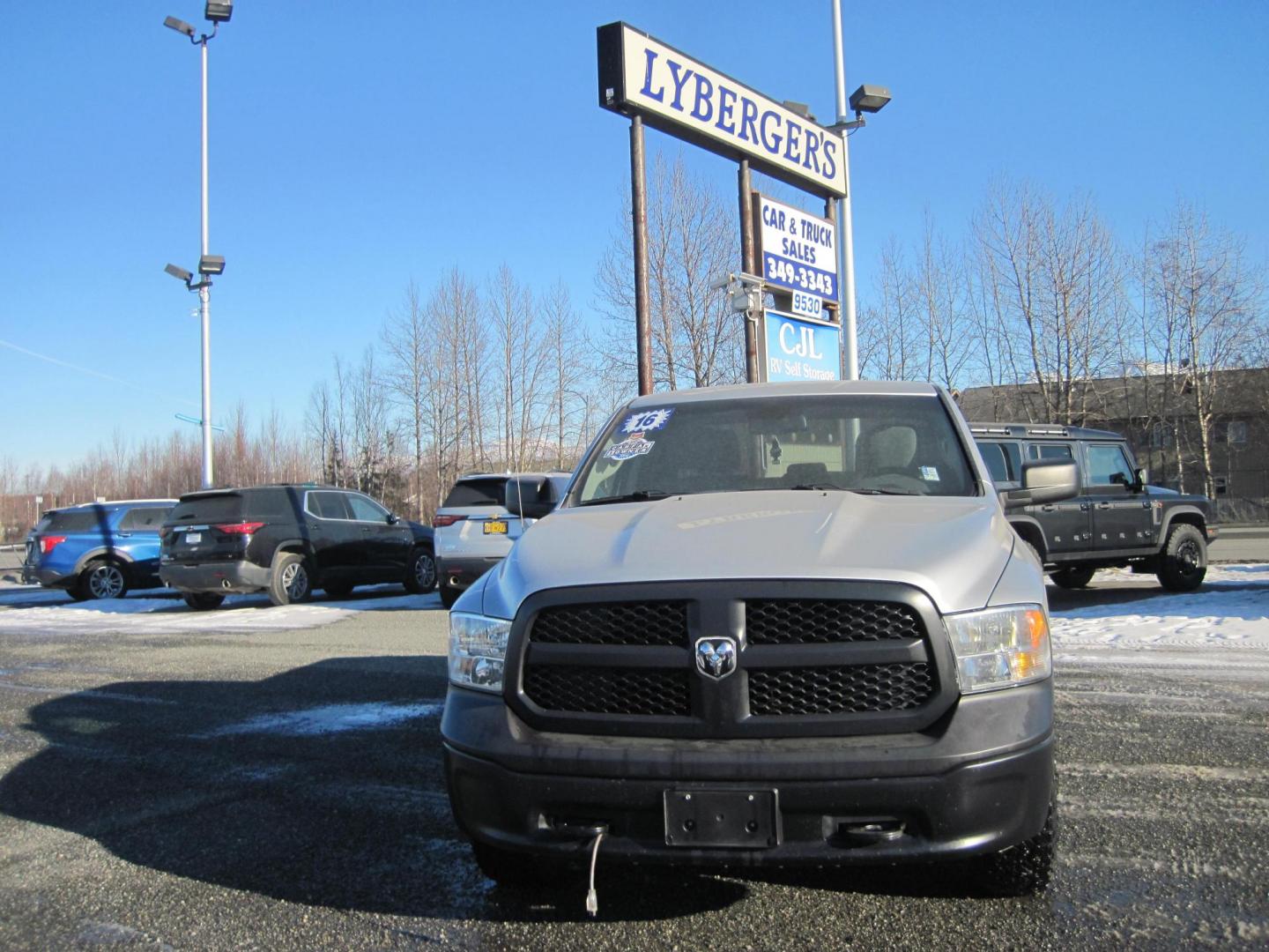 2016 silver /gray RAM 1500 Tradesman Quad Cab 4WD (1C6RR7FG7GS) with an 3.6L V6 DOHC 24V FFV engine, 6A transmission, located at 9530 Old Seward Highway, Anchorage, AK, 99515, (907) 349-3343, 61.134140, -149.865570 - Low Miles on the Ram 1500 Quad cab come take a test drive - Photo#1