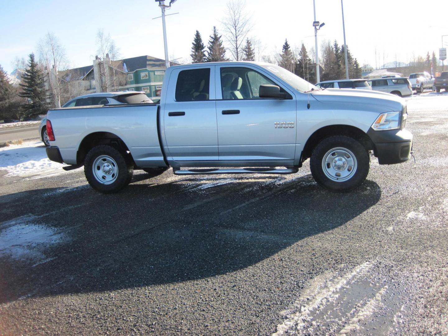 2016 silver /gray RAM 1500 Tradesman Quad Cab 4WD (1C6RR7FG7GS) with an 3.6L V6 DOHC 24V FFV engine, 6A transmission, located at 9530 Old Seward Highway, Anchorage, AK, 99515, (907) 349-3343, 61.134140, -149.865570 - Low Miles on the Ram 1500 Quad cab come take a test drive - Photo#2